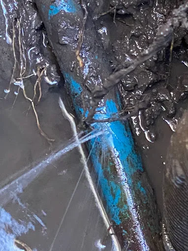 Water-line piping exposed for repair