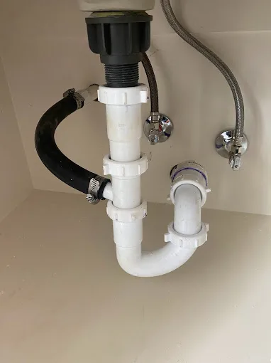Sink drain and trap installation