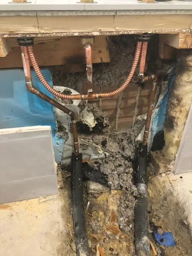 Plumbing inside an opened wall